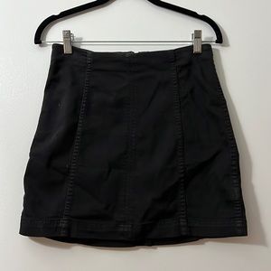 Black denim mini skirt. Free people size 4